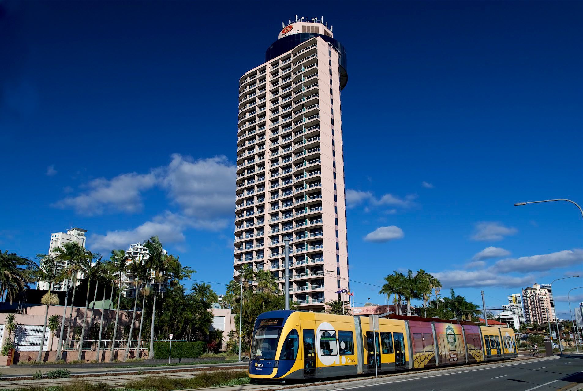 The G:Link tram passing in front of the Crowne Plaza hotel.